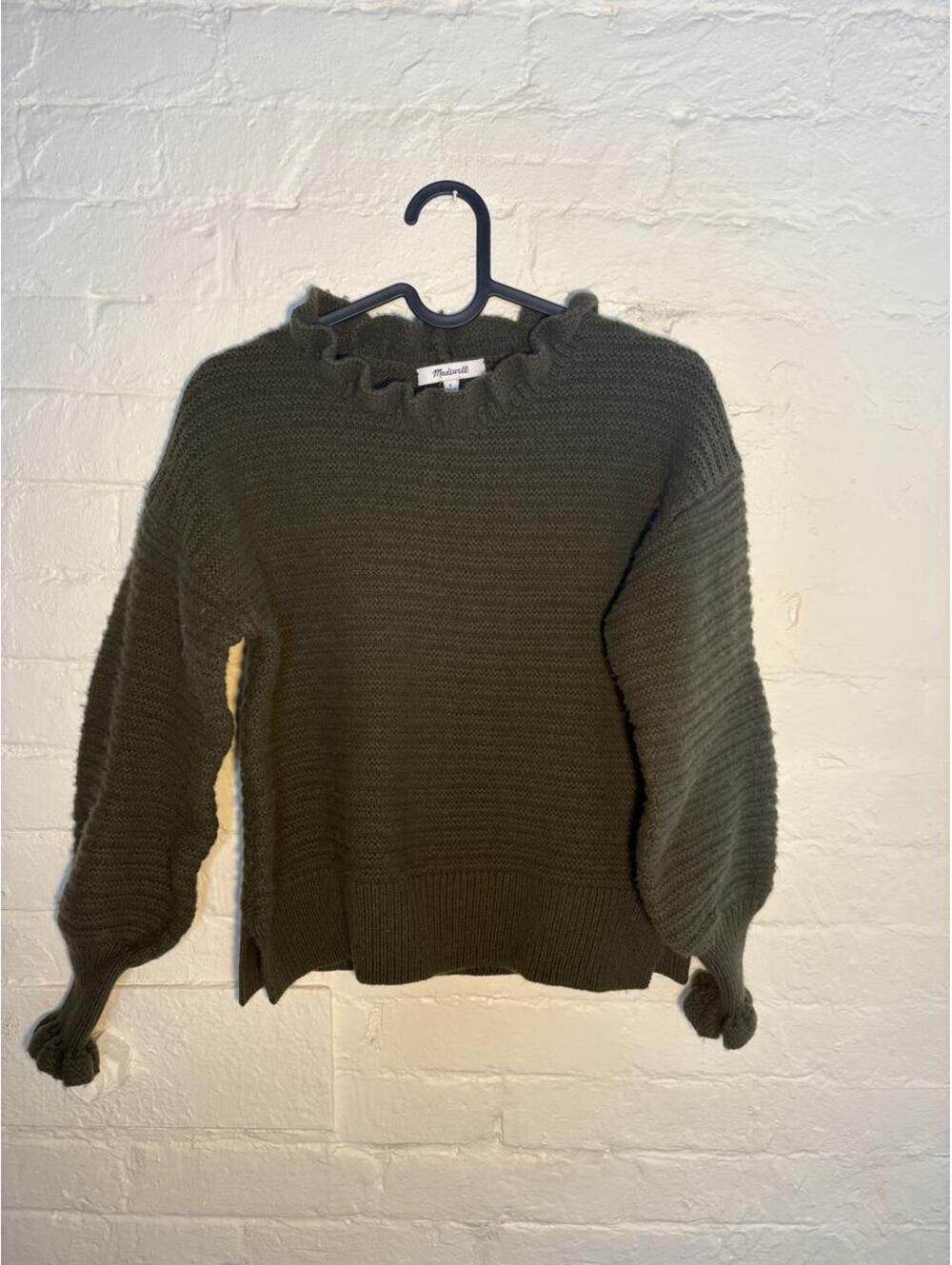 Madewell olive green sweater with ruffle neckline and balloon sleeves